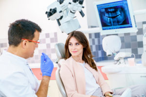 Happy Elder Woman During The Consultation With Handsome Dentist Showing  Panoramic X-ray In The Dental Office Stock Photo, Picture And Royalty Free  ImageImage 114781085.