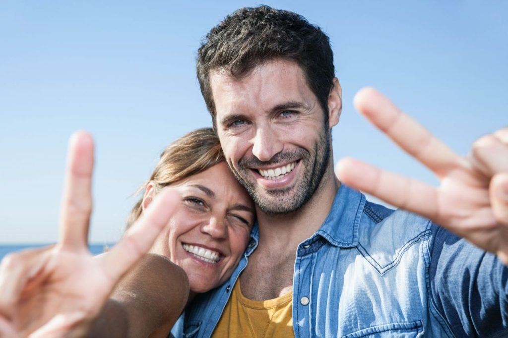 people smiling with white teeth