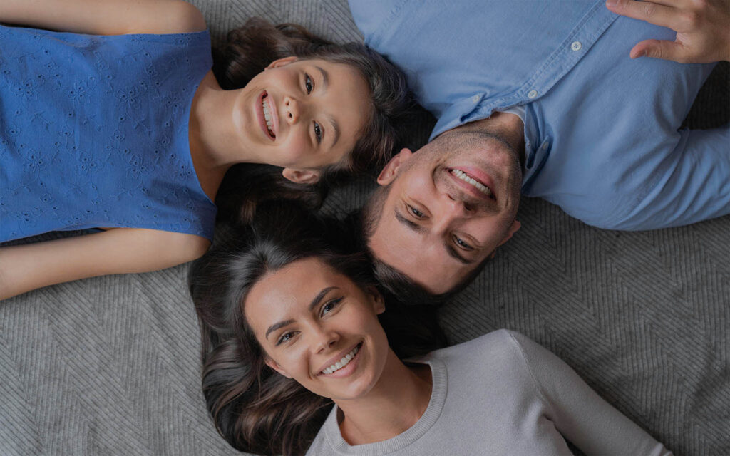 family smiling, what does a cavity look like